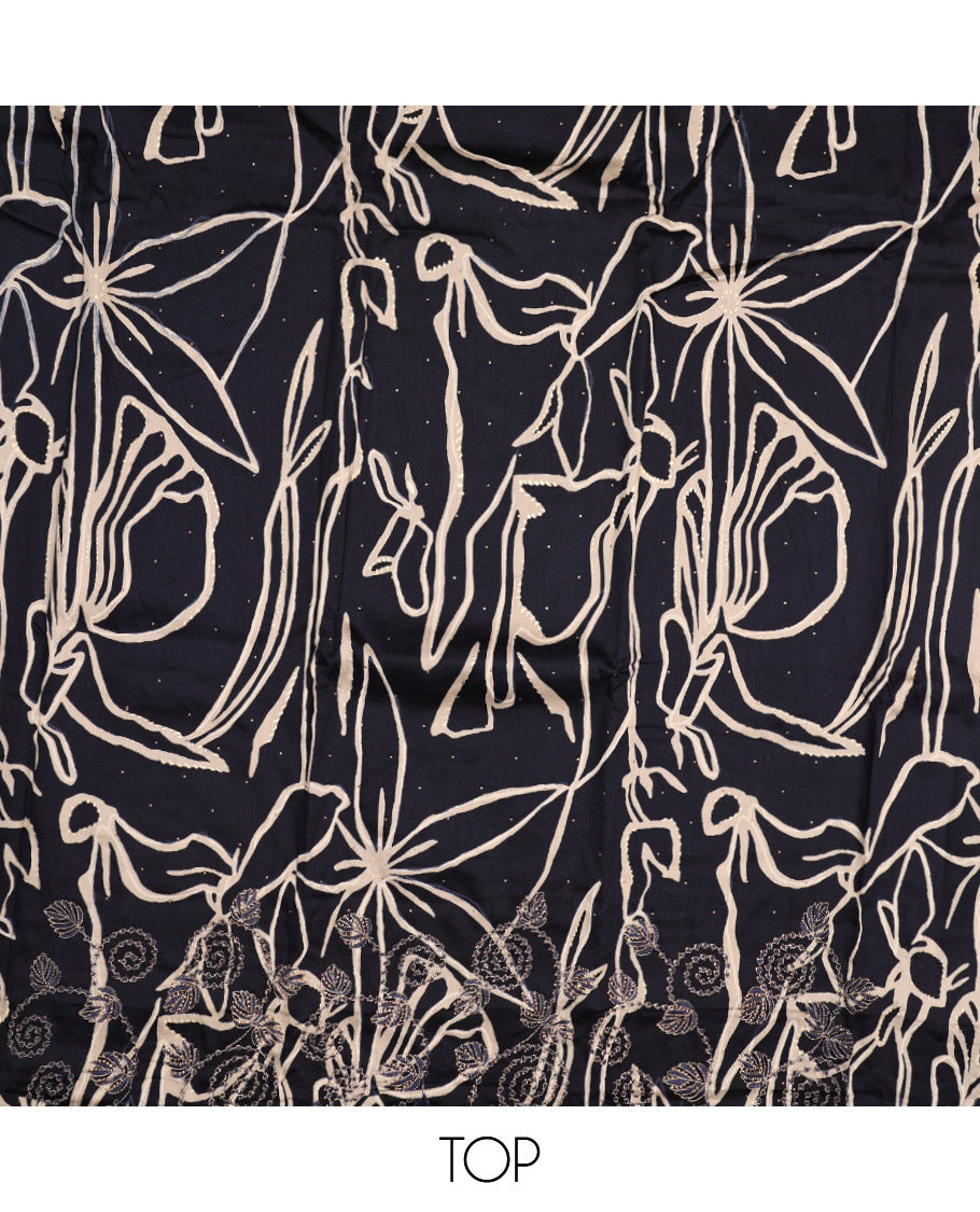 Black Material Chudidar Set, Artfully Detailed with Abstract Print and Floral Embroidered Cotton Top, a Plain Cotton Bottom, and Paired with Intricately Printed Cotton Dupatta