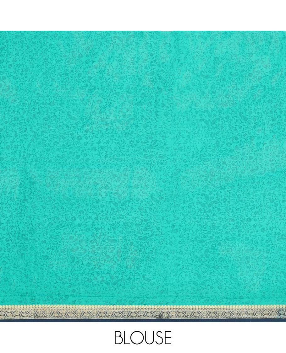 Blue paisley printed semi-banaras printed saree, contrast zari border & intricate pallu