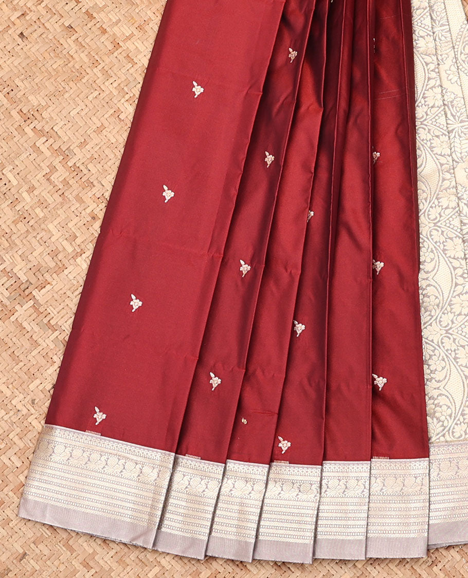 Maroon Budget Silk Saree, Gleamed Up with Zari Buttas, Captivating Contrast Traditional Zari Design Border, Pallu of Intricate Design, and Has a Contrast Blouse