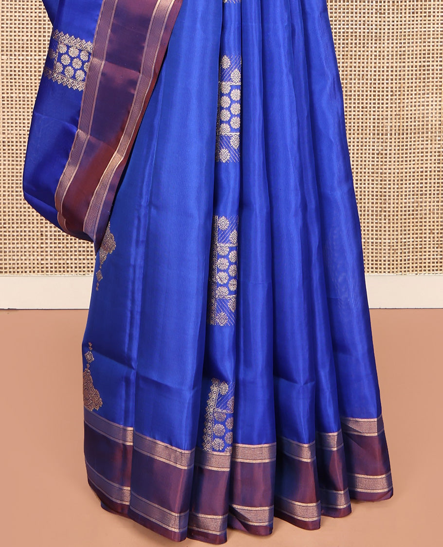 Blue Mayuri Lite Silk Mix Saree, Beautifully Bedecked with Zari Buttas All Over Its Body, Complemented by a Contrast Rettai Pettu Border, Pallu of Intricate Designs, and Paired with a Contrast Blouse