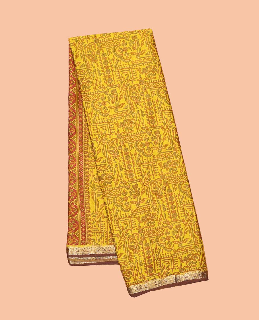 Yellow intricately printed semi-banaras printed saree, contrast zari border & intricate pallu