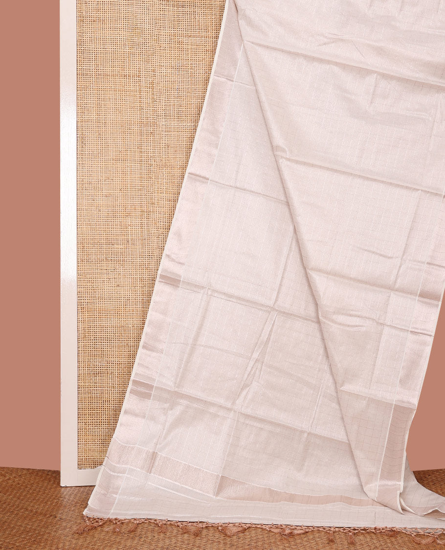 Off-White Kerala Cotton Saree Subtly Sparkled with Zari Checks All Over Its Body, Zari Bavanji Border, Pallu Mirrors the Same Design, and Paired with a Matching Blouse