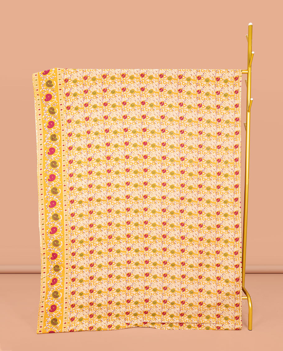 Yellow Machine-Printed Kalamkari Cotton Saree, Decked Up with Batik Vines on Its Body, Highlighted by a Self-Border of Batik Paisley Print, Pallu of Floral-Peacock Print, and Paired with a Printed Blouse