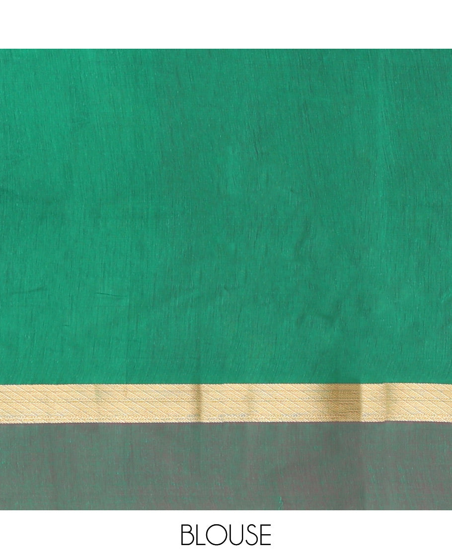 Rani Pink Semi-Silk Cotton Saree, Artfully Designed with Peacock Zari Buttas on Its Body, Complemented by a Contrast Border of Peacock Designs, Pallu Steeped with Peacock Zari Design, and Paired with a Matching Blouse