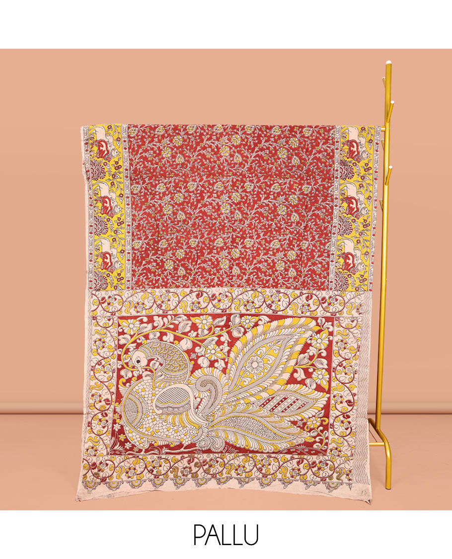 Maroon Machine-Printed Kalamkari Cotton Saree, Featuring Floral Vines on Its Body, Complemented by a Contrast Border of Pichwai Cow Print, Pallu of Peacock Print, and Paired with a Printed Blouse