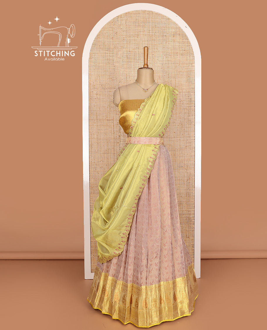 Peach art silk half-saree, sparsely design with contrast traditional motifs bordered skirt, contrast blouse, and scallop embroidered dhavani