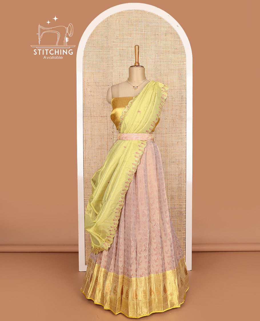 Peach art silk half-saree, sparsely design with contrast traditional motifs bordered skirt, contrast blouse, and scallop embroidered dhavani