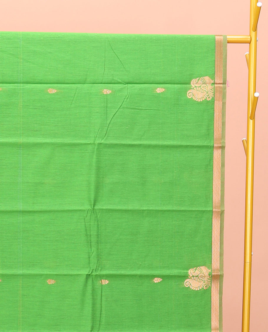 Parrot Green Semi-Silk Cotton Saree, Mesmerized with Buttas and Peacock Buttas All Over Its Body, a Subtle Zari Piping Border, Pallu of Peacock Butta Enclosed Checked Design, and Paired with a Contrast Blouse