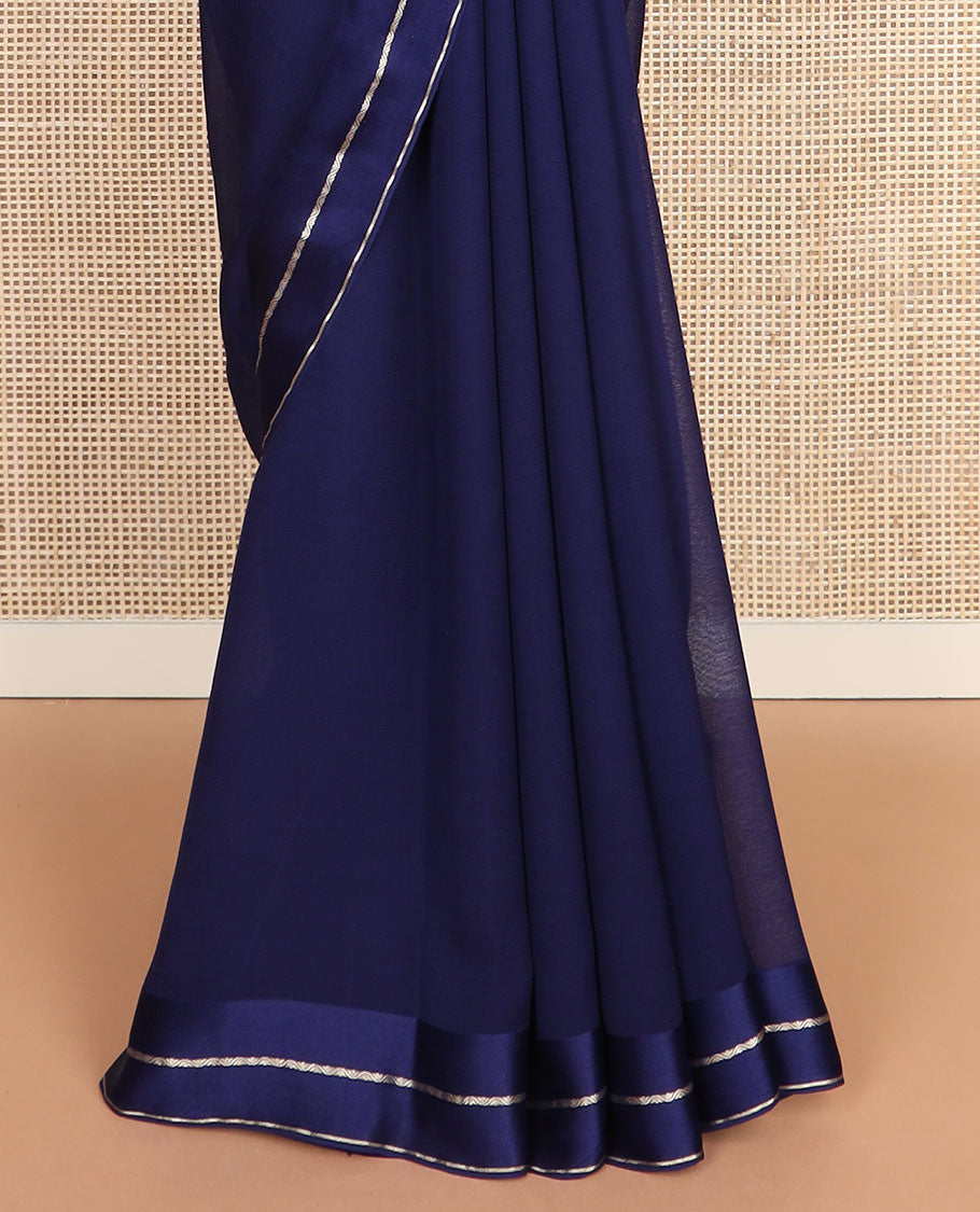 Navy blue plain design pure chiffon saree, zari border of neli kathir design, and pallu steeped with zari stripes