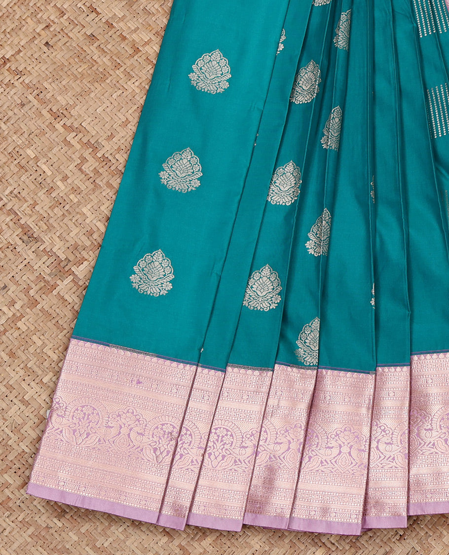 Peacock Blue Budget Silk Saree, Mesmerized with Zari Buttas All Over Its Body, Complemented by a Contrast Traditional Zari Design Border, Intricate Pallu, and Paired with a Contrast Blouse