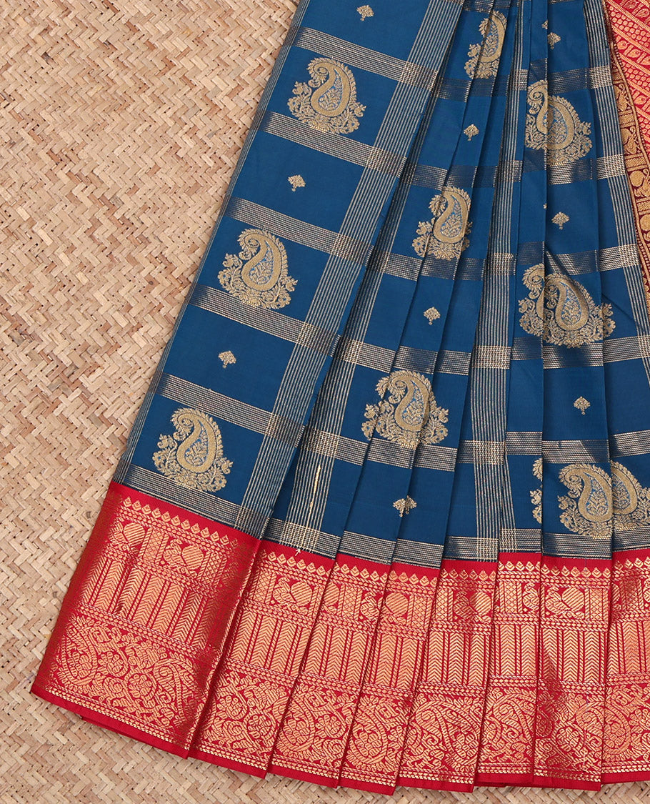 Blue Budget Silk Saree, Decked Up with Paisley Butta Enclosed Checks on Its Body, Complemented by a Contrast Traditional Zari Design Border, Grandly Decked Up Pallu, and Paired with a Contrast Blouse