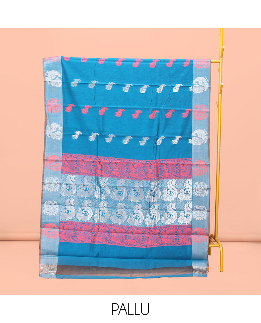 Blue Semi-Silk Cotton Saree, Graced with Peacock Buttas All Over Its Body, a Self-Border of Peacock Designs, Pallu Steeped with Peacock Zari Design, and Paired with a Matching Blouse