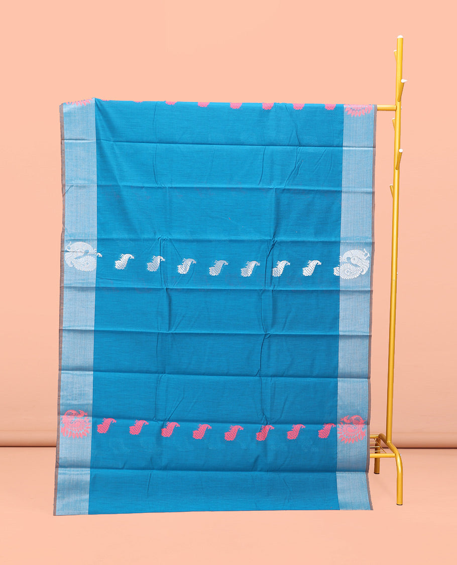 Blue Semi-Silk Cotton Saree, Graced with Peacock Buttas All Over Its Body, a Self-Border of Peacock Designs, Pallu Steeped with Peacock Zari Design, and Paired with a Matching Blouse