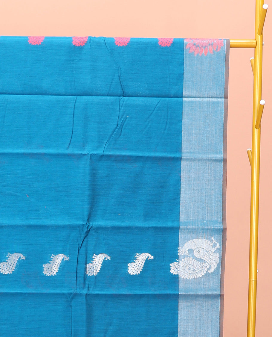 Blue Semi-Silk Cotton Saree, Graced with Peacock Buttas All Over Its Body, a Self-Border of Peacock Designs, Pallu Steeped with Peacock Zari Design, and Paired with a Matching Blouse