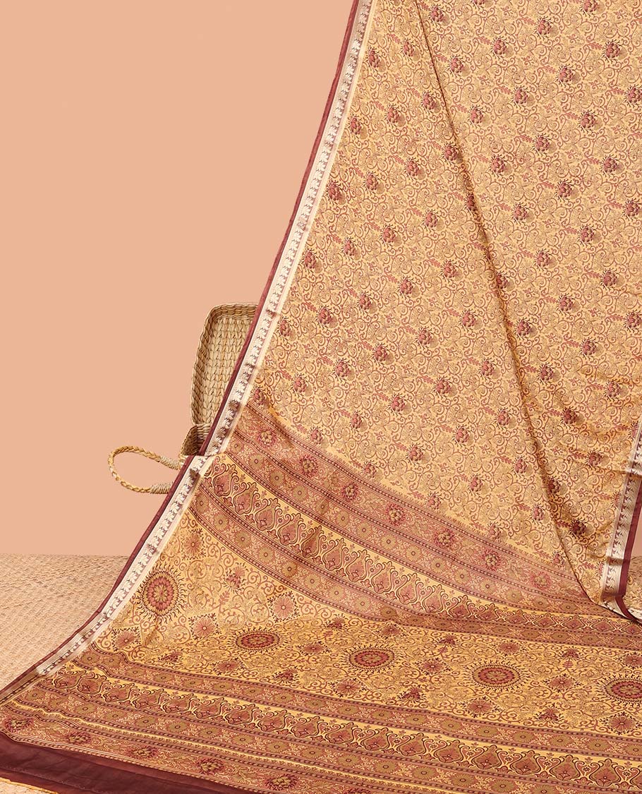 Orange intricately printed semi-banaras printed saree, contrast floral border & intricate pallu