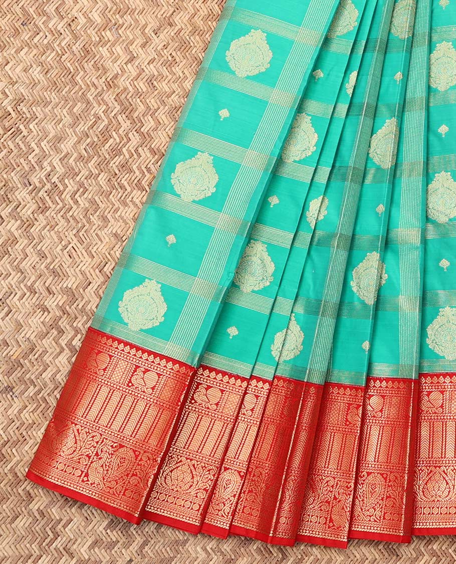 Turquoise Budget Silk Saree, Gleamed Up with Zari Buttas and Checks, a Contrast Traditional Zari Design Border, Grand Pallu, and a Contrast Blouse