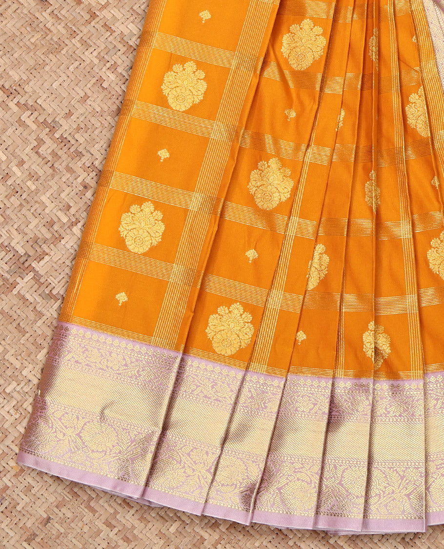 Yellow Budget Silk Saree, Sparsely Woven with Zari Butta Enclosed Checks on Its Body, Complemented by a Contrast Traditional Zari Design Border, Grandly Decked Up Pallu, and Paired with a Contrast Blouse