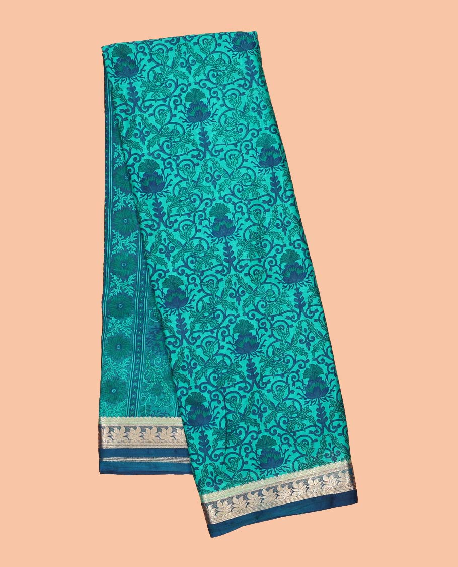 Blue intricately printed semi-banaras printed saree, contrast floral border & intricate pallu