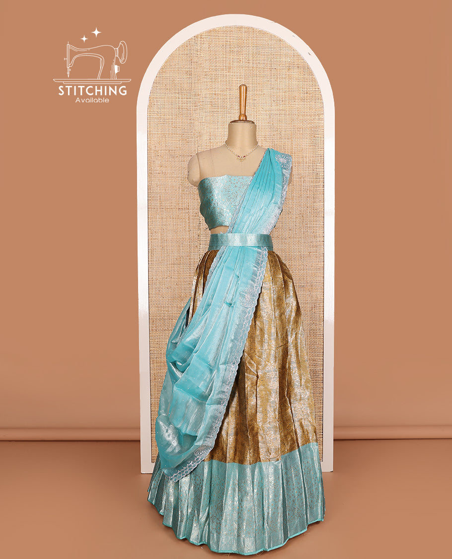 Mustard art silk half-saree, floral vine design with contrast traditional zari bordered skirt, contrast jacquard blouse, and scallop embroidered dhavani