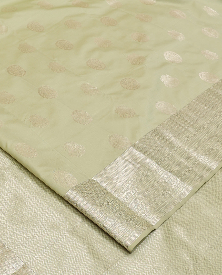Pale green zari buttas Vasundhara silk mix saree, zari border of neli,kodi visiry,muthu, and vanki designs, and vanki pallu