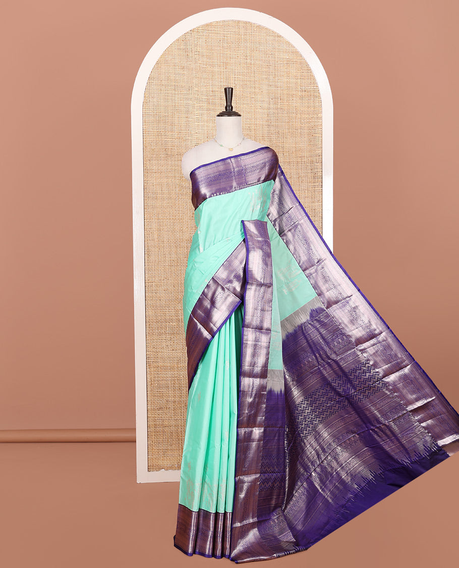 Turquoise Budget Silk Saree, Enthralled with Zari Buttas on Its Body, Complemented by a Contrast Traditional Zari Design Border, Chevron Striped Pallu, and Paired with a Contrast Blouse