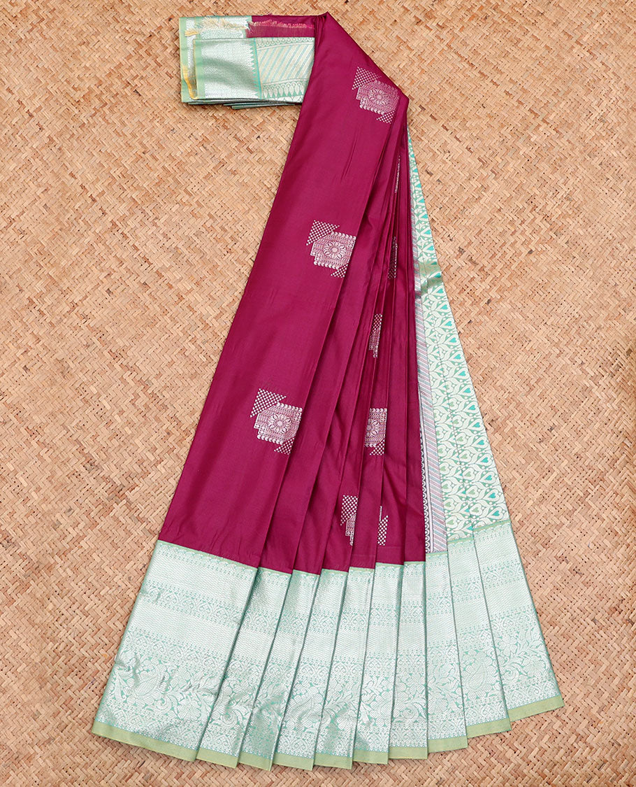 Light Maroon Budget Silk Saree, Bedecked with Buttas All Over Its Body, Complemented by a Contrast Traditional Zari Design Border, Pallu of Intricate Designs, and Paired with a Contrast Blouse