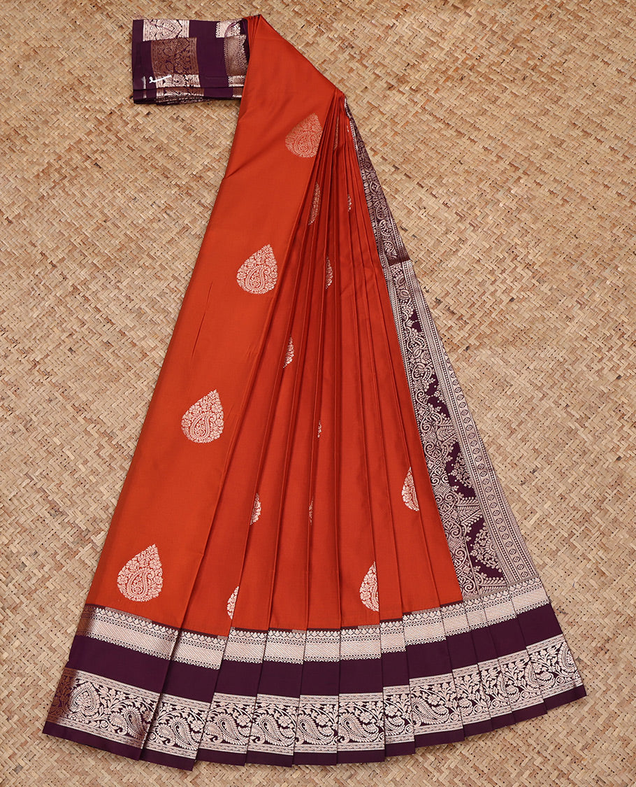 Orange Budget Silk Saree, Detailed with Zari Buttas All Over Its Body, Complemented by a Contrast Traditional Zari Design Rettai Pettu Border, Intricate Pallu, and Paired with a Contrast Blouse