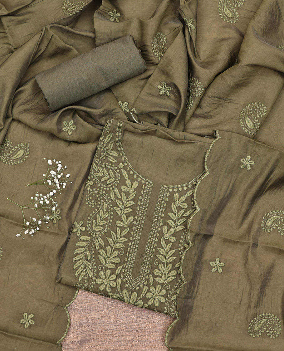 Green Material Chudidar Set, Delicately Woven with Floral-Paisley Embroidered Muslin Top, a Plain Santoon Bottom, and Paired with Intricately Printed Muslin Dupatta