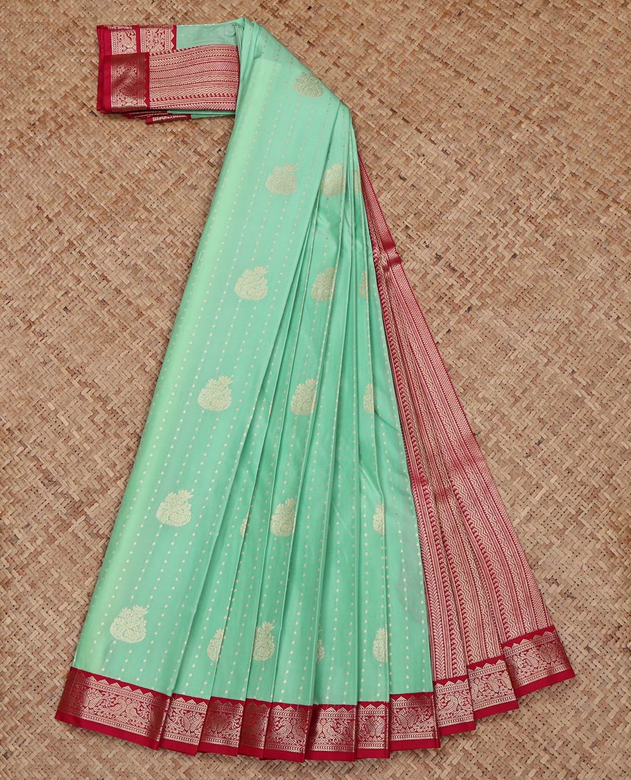 Turquoise Budget Silk Saree, Spotlighted with Zari Buttas on Its Body, Complemented by a Contrast Traditional Zari Border of Peacock Designs, Geometric Patterned Pallu, and Paired with a Contrast Blouse