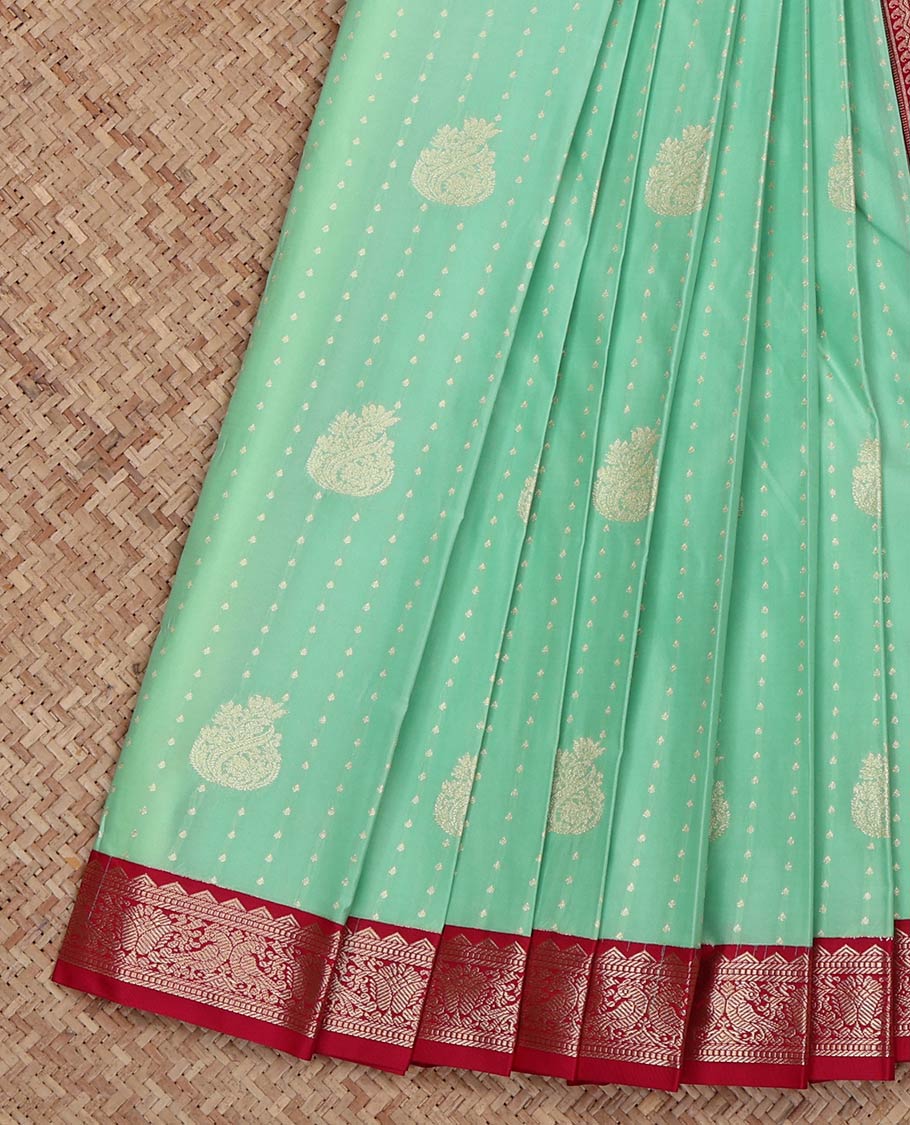 Turquoise Budget Silk Saree, Spotlighted with Zari Buttas on Its Body, Complemented by a Contrast Traditional Zari Border of Peacock Designs, Geometric Patterned Pallu, and Paired with a Contrast Blouse