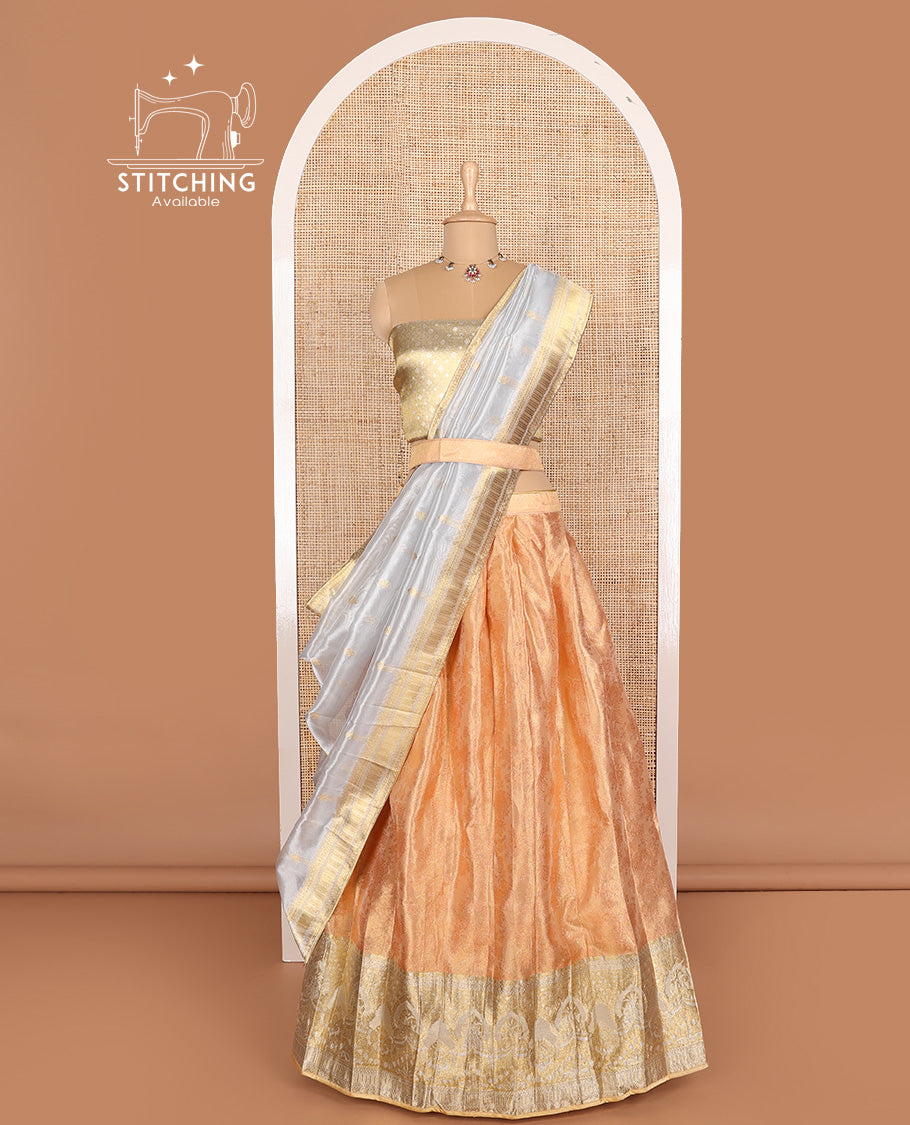 Orange art silk half-saree, floral design with contrast traditional zari bordered skirt, contrast jacquard blouse, and traditional motif dhavani
