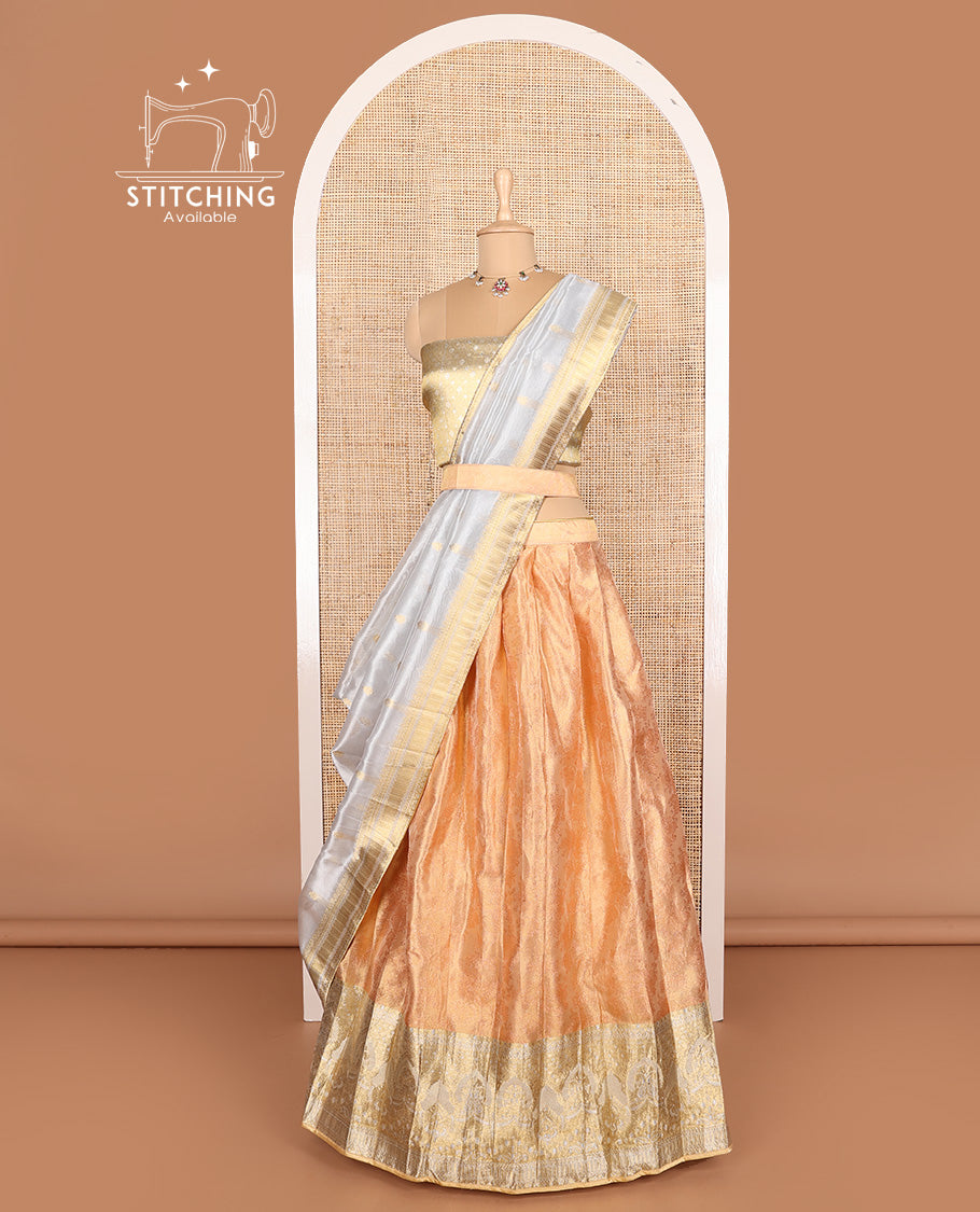Orange art silk half-saree, floral design with contrast traditional zari bordered skirt, contrast jacquard blouse, and traditional motif dhavani