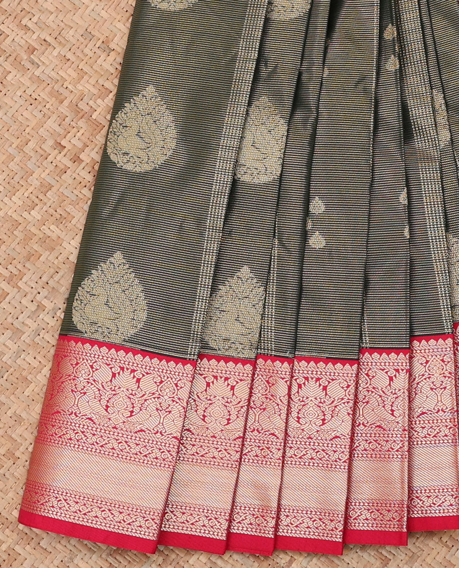 Green Budget Silk Saree, Gleamed Up with Zari Buttas and Stripes, a Contrast Traditional Zari Border, Grand Pallu, and a Contrast Blouse