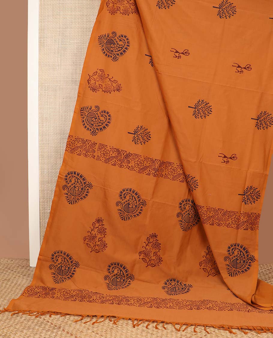 Borderless orange tree and warli motifs printed poly cotton saree, floral-paisley printed pallu