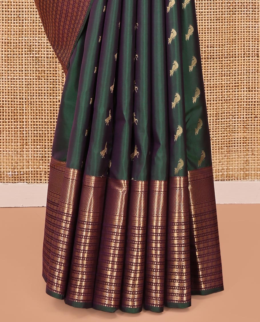 Green Vasundhara Lite Silk Saree, Enriched with Zari Buttas All Over Its Body, Complemented by Contrast Border of Rekku, Poun, Ara Maadam, and Geometric Patterns, Grand Pallu and Paired with a Contrast Blouse