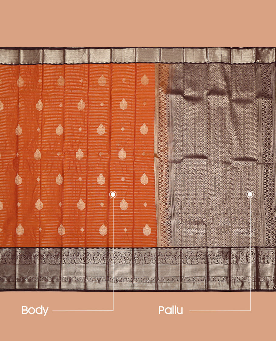 Rust Budget Silk Saree, Ornamented with Zari Buttas and Zari Stripes on Its Body, Complemented by a Contrast Traditional Zari Design Border, Pallu of Paisley and Chevron Stripes, and Paired with a Contrast Blouse