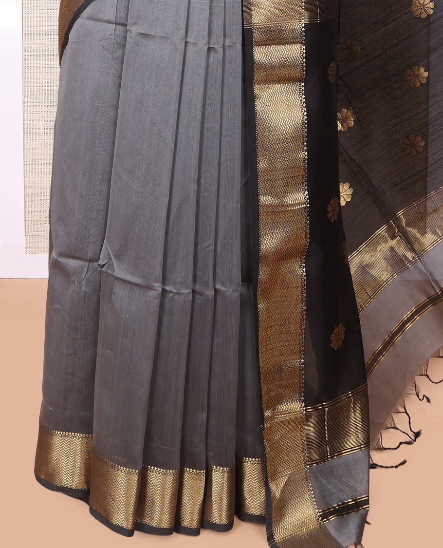 Grey Maheshwari Cotton Saree, Embellished with Buttas, Highlighted by a Traditional Zari Border, Pallu Gleamed Up with Zari Buttas, and a Contrast Blouse