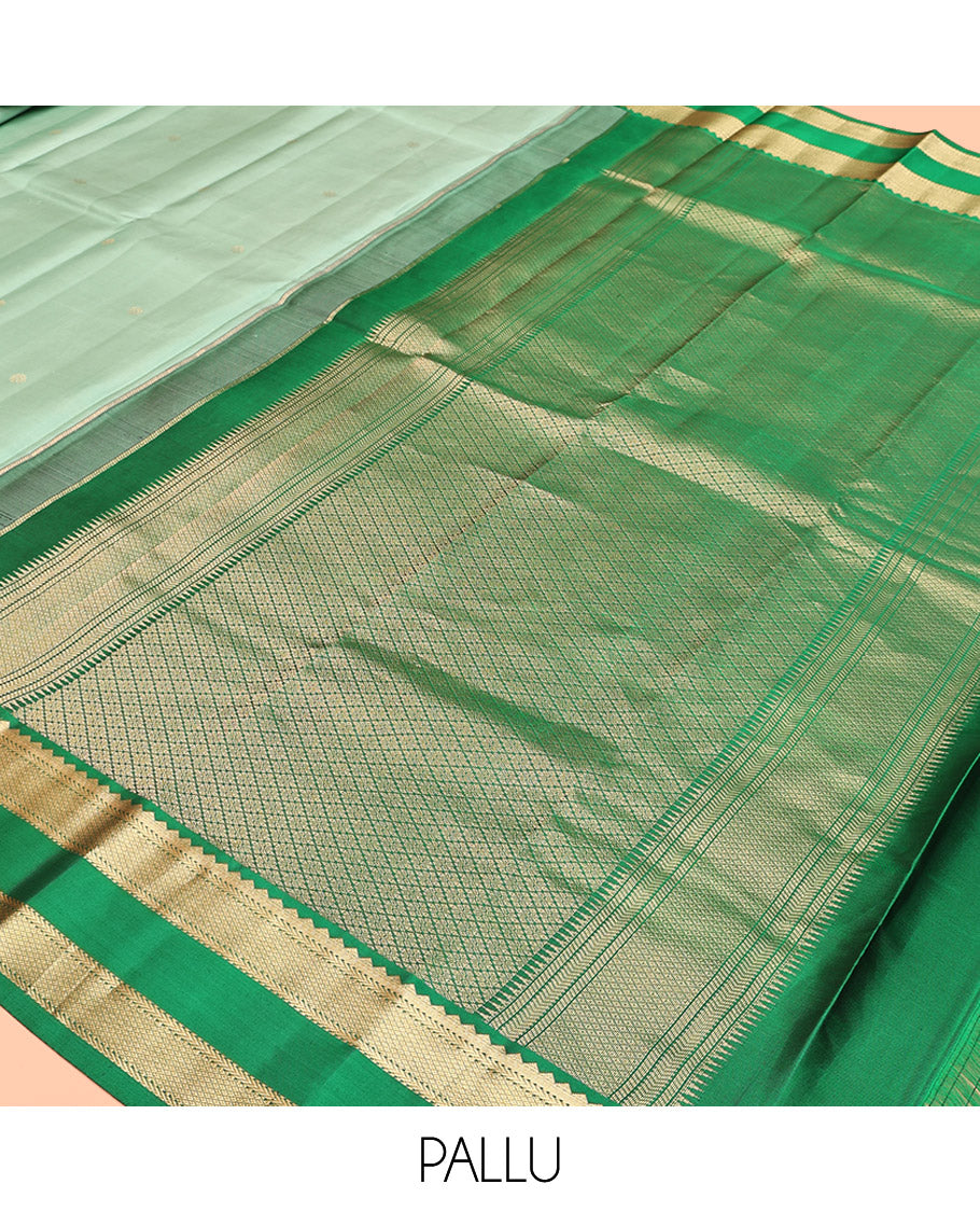 Green Kanchipuram Silk Saree, Woven with Zari Buttas, Contrast Korvai Rettai Pettu Border of Rekku, Kathir, and Mayil Kann Designs, Pallu of Jaal Design, and a Contrast Blouse