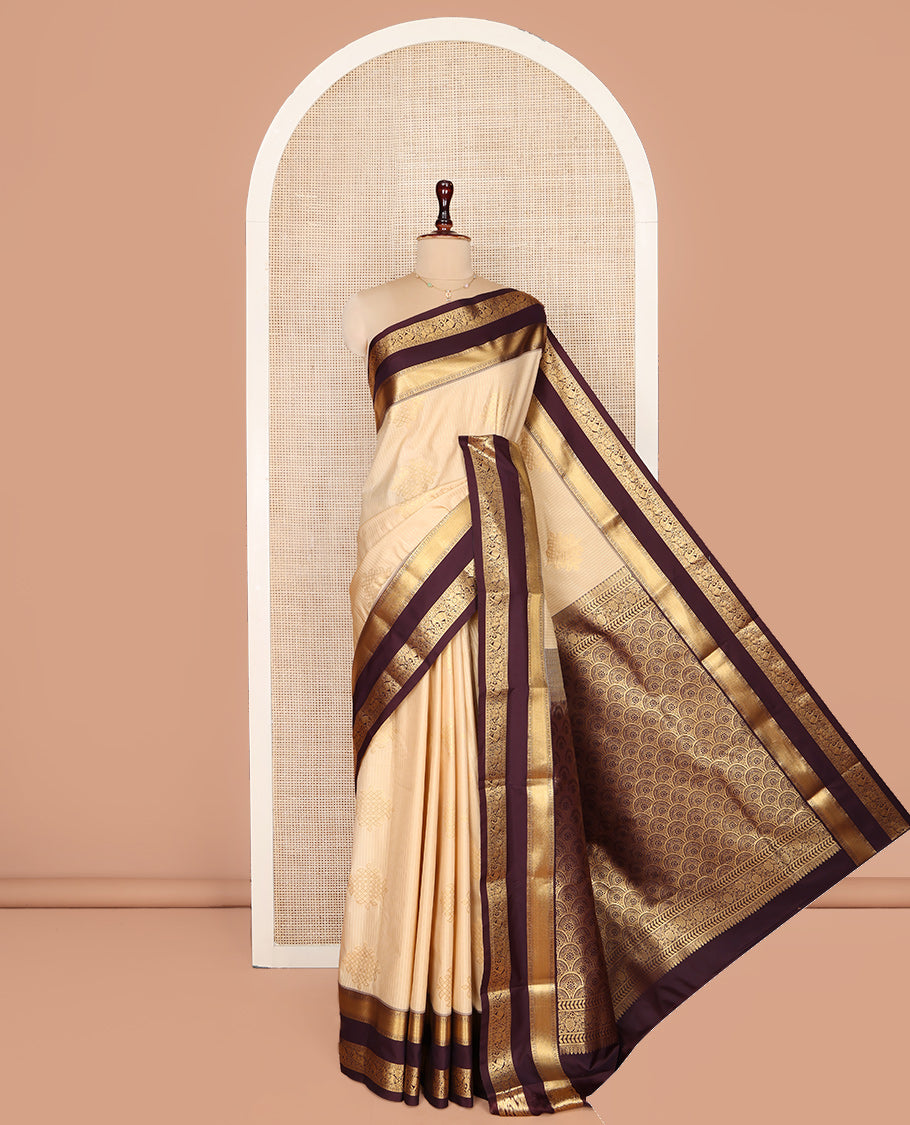 Sandal Budget Silk Saree, Embellished with Zari Stripes and Kolam Buttas All Over Its Body, Complemented by a Contrast Traditional Zari Design Rettai Pettu Border, Grand Scallop Design Pallu, and Paired with a Contrast Blouse