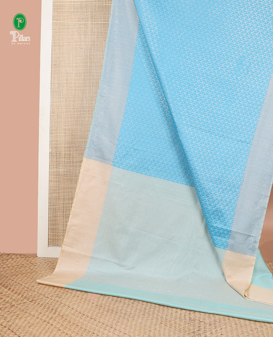 Light blue silver zari weaving silk cotton saree with self border & contrast pallu along with plain blouse