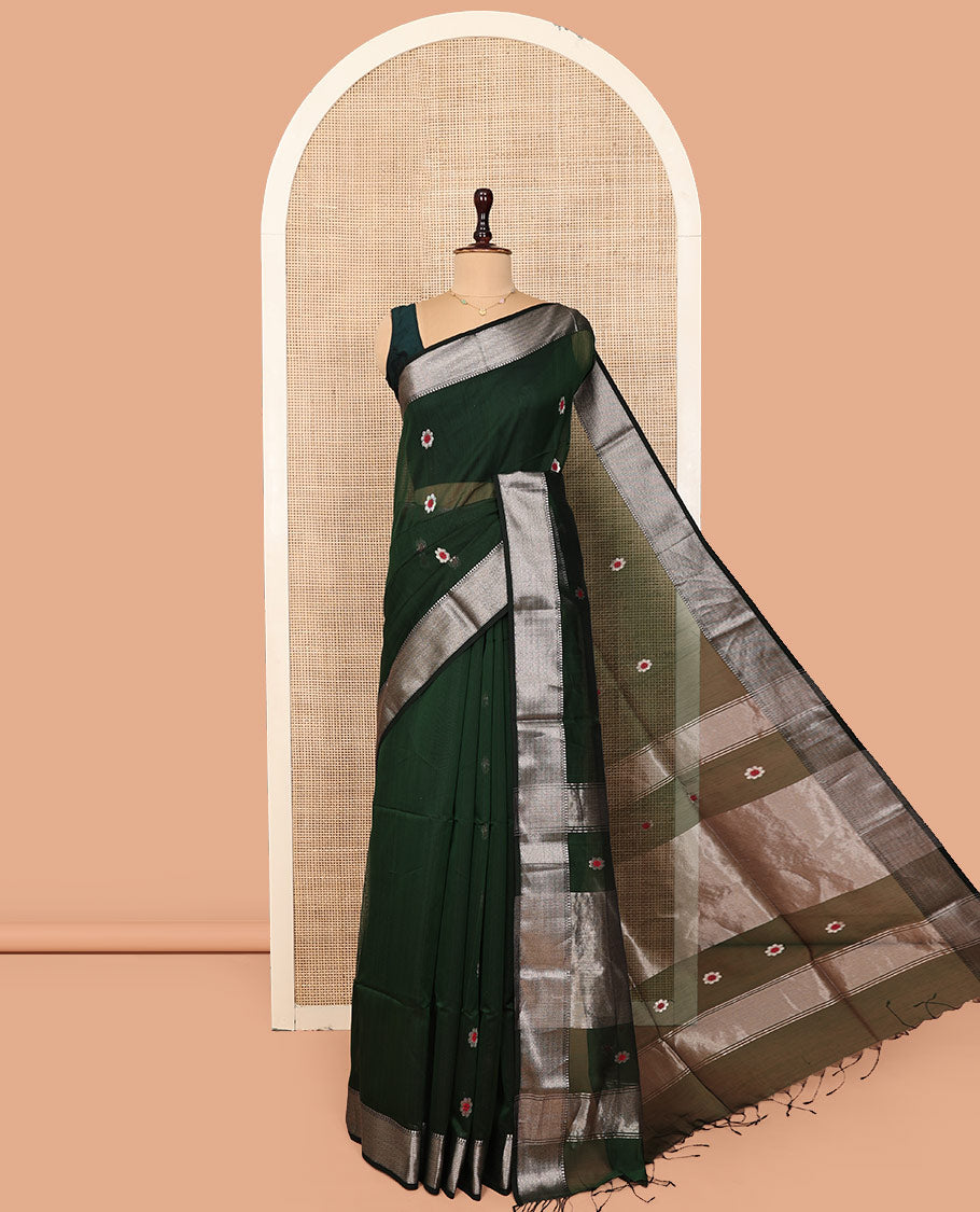 Green Maheshwari Cotton Saree, Bedecked with Meena Buttas All Over Its Body, Highlighted by a Traditional Zari Woven Border, Pallu Steeped with Gleaming Zari Stripes and Buttas, and Paired with a Matching Blouse