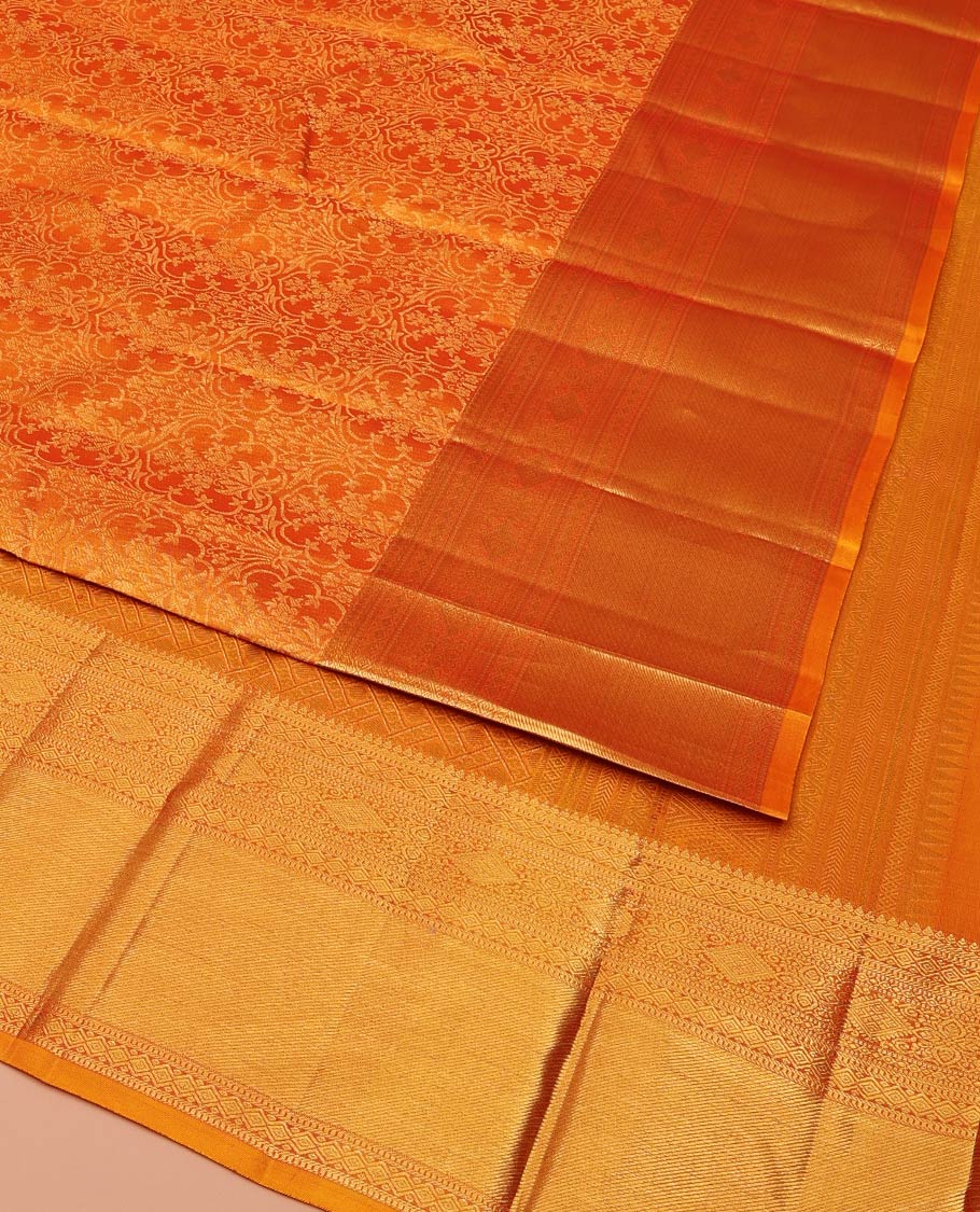 Rust Kanchipuram Wedding Silk Saree, Subtly Sparkled With Jacquard Design On Its Body, Highlighted by Zari Border of Thilakam Mokku, Diamond, and Muthu Designs, Grand Pallu and Paired with a Matching Blouse