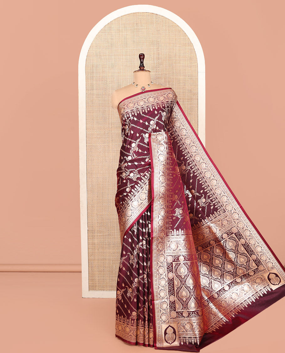 Wine Banarasi Nylon Saree, Prettified with Zari Designs, Highlighted by a Floral Creeper Zari Border, Intricate Pallu, and a Matching Blouse