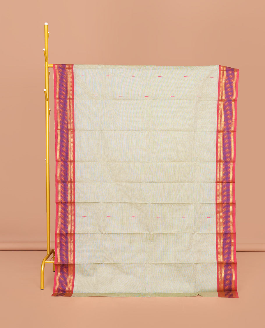 Pale Green Chettinad Cotton Saree, Featuring Buttas All Over Its Body, Complemented by Contrast Traditional Zari Border, Pallu of Stripes, and Paired with a Matching Blouse