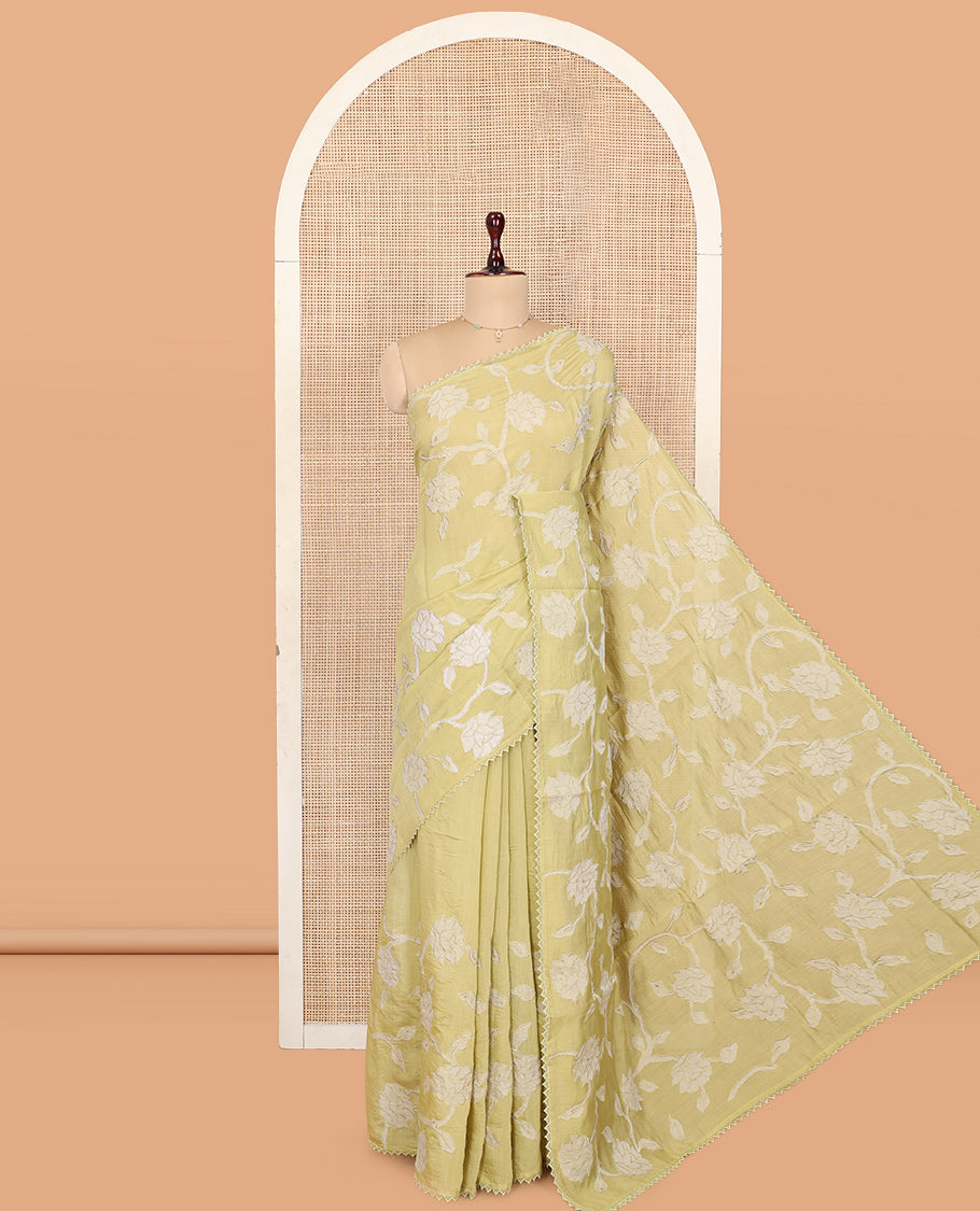 Pale Green Tussar Silk Saree, Prettified with Floral Vine Embroidery, Lace Border, and a Matching Blouse