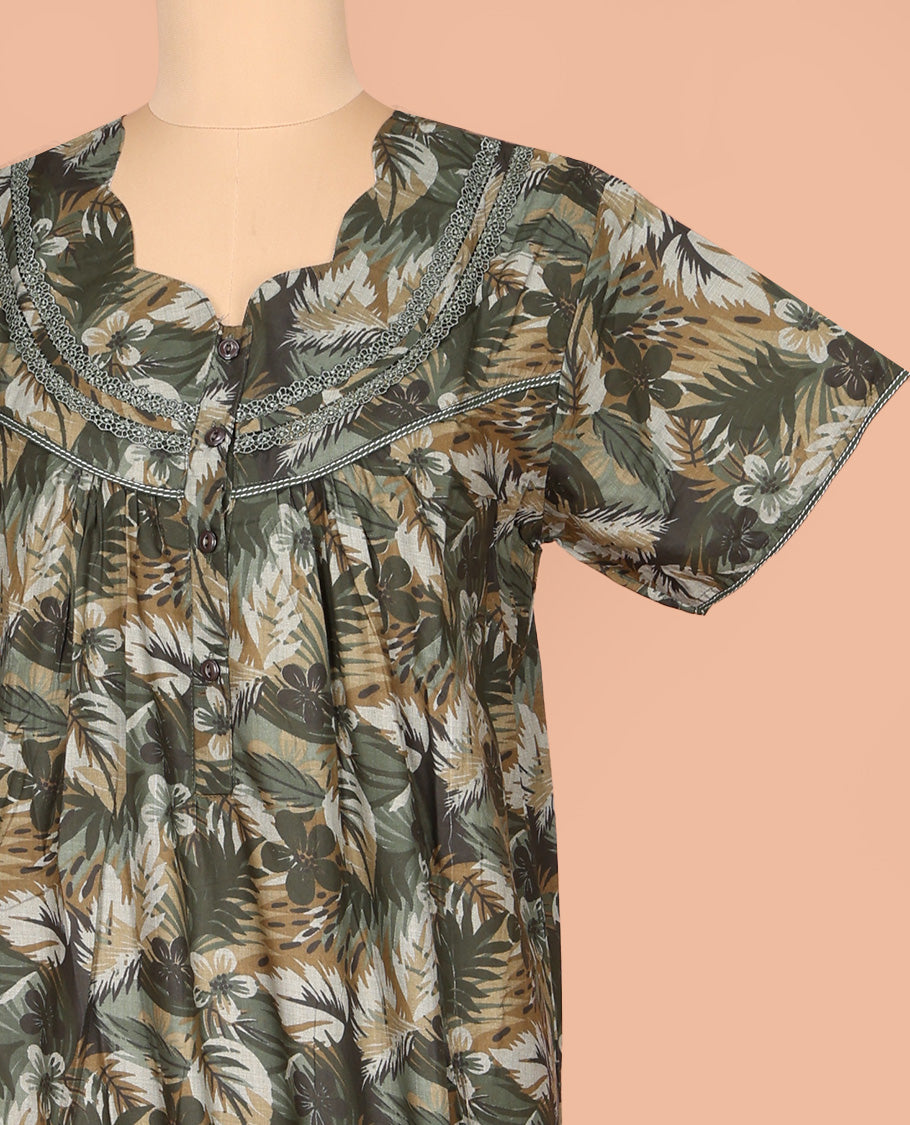 Green Cotton Nighty Bedecked with Tropical Floral Print, Featuring Lace Work, Scallop Front Neck, and Half Sleeves