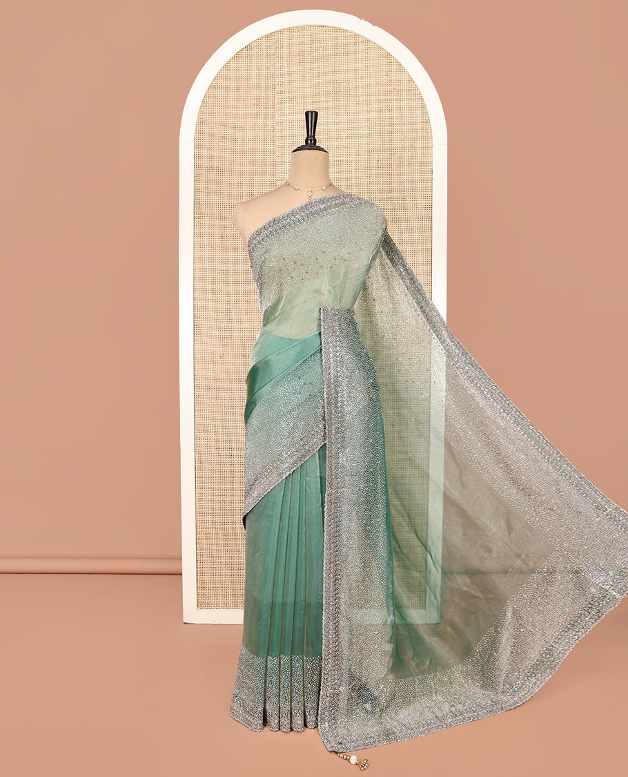 Emerald Green Fendi Silk Saree with Swarovski Stonework Border, and a Stonework Blouse