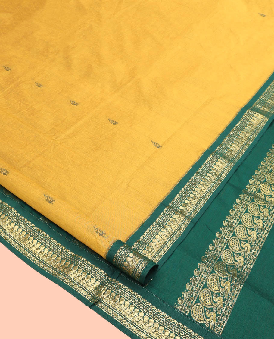 Mustard Nine Yard Cotton Saree, Subtly Sparkled with Buttas All Over Its Body, Complemented by Contrast Traditional Zari Design Border, Pallu of Traditional Designs, and Comes Without a Blouse