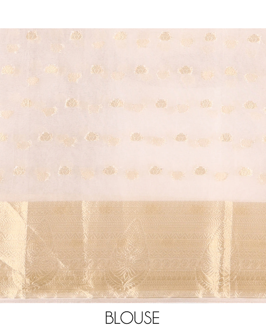 Cream Semi-Organza Saree, Shimmering with Zari Buttas All Over Its Body, Highlighted by a Traditional Zari Design Border, Gleaming Zari Design Pallu, and Paired with a Matching Blouse