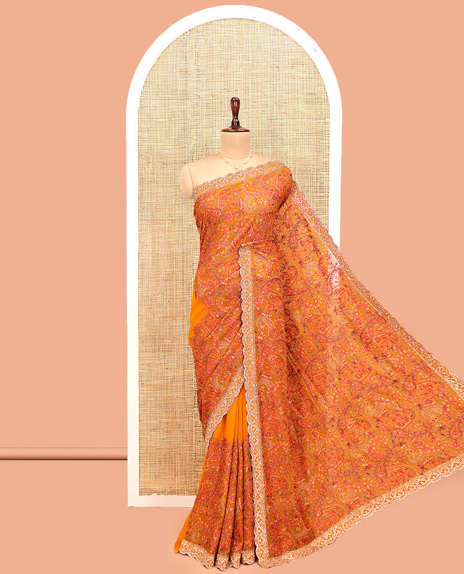 Orange Designer Saree, Richly Detailed with Paisley Mixed Embroidery, a Scallop Stone Work Border, and a Matching Blouse